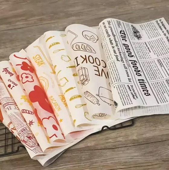 Giấy sáp và giấy nến in có lớp phủ phân hủy sinh học và mực in gốc đậu nành 