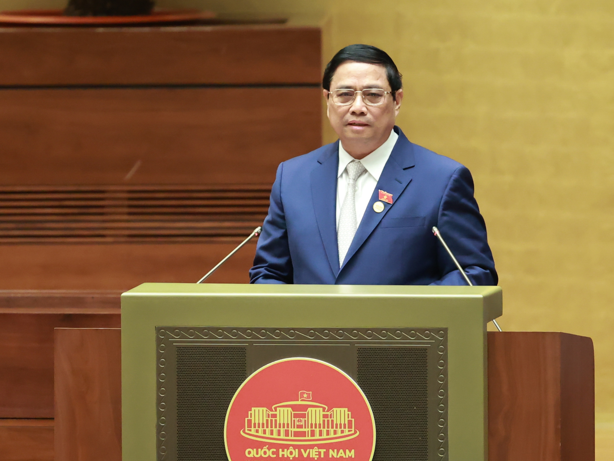 TOÀN VĂN: Báo cáo của Chính phủ do Thủ tướng Phạm Minh Chính trình bày tại phiên khai mạc Kỳ họp thứ 6, Quốc hội khóa XV - Ảnh 1.